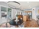This kitchen features stainless steel appliances, granite countertops, and an island with wood cabinets at 25521 Bruford Blvd, Land O Lakes, FL 34639
