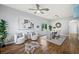 The living room features neutral colors, a decorative rug, and plenty of natural light at 25521 Bruford Blvd, Land O Lakes, FL 34639