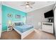 Bedroom features a queen-size bed, and a mounted TV at 2814 Duncan Tree Cir, Valrico, FL 33594