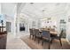 Formal dining room with chandelier lighting, neutral decor, and ample seating at 2814 Duncan Tree Cir, Valrico, FL 33594