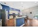 Open kitchen with stainless steel appliances, granite countertops, and eat-in bar at 2814 Duncan Tree Cir, Valrico, FL 33594