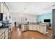 A view of the kitchen area, complete with granite countertops, a stainless steel dishwasher, and stainless steel oven at 2814 Duncan Tree Cir, Valrico, FL 33594