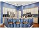 Stylish kitchen with breakfast bar, stainless steel appliances, and updated cabinetry at 2814 Duncan Tree Cir, Valrico, FL 33594