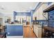 Kitchen with breakfast bar, stainless steel appliances, and view to dining room at 2814 Duncan Tree Cir, Valrico, FL 33594