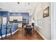 A view of the kitchen and dining area, complete with bar seating at the granite counter at 2814 Duncan Tree Cir, Valrico, FL 33594