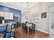 Bright eat-in kitchen with wood floors, an island, and a sliding glass door at 2814 Duncan Tree Cir, Valrico, FL 33594