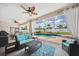 Relaxing screened-in patio with comfortable seating, stylish decor, and a view of the sparkling pool at 2814 Duncan Tree Cir, Valrico, FL 33594