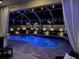 Relaxing screened pool with ambient lighting, pavers, and privacy features at 2814 Duncan Tree Cir, Valrico, FL 33594