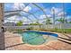 Inviting screened-in pool with paver deck, landscaping, and clear blue water for relaxation and enjoyment at 2814 Duncan Tree Cir, Valrico, FL 33594