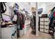 Walk-in closet with custom shelving and storage solutions at 2814 Duncan Tree Cir, Valrico, FL 33594