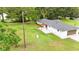 Expansive backyard featuring a pergola-covered patio, perfect for outdoor entertaining at 2933 Stearns Rd, Valrico, FL 33596