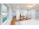 Bedroom boasts a closet, ensuite bath, hardwood flooring, and neutral paint at 2933 Stearns Rd, Valrico, FL 33596