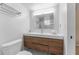 Bathroom featuring updated vanity, modern lighting and tile floors at 3002 W Cleveland St # D4, Tampa, FL 33609