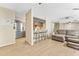 Living area with barstool seating and a comfortable sofa, offering a relaxing space at 3002 W Cleveland St # D4, Tampa, FL 33609