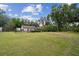 Expansive backyard with lush greenery, pool, RV and a peaceful setting at 3018 Pemberton Trace Ct, Plant City, FL 33565