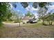 A nice backyard with an RV trailer, car, and lots of space at 3018 Pemberton Trace Ct, Plant City, FL 33565