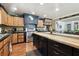 Bright kitchen featuring a wooden island, stainless steel oven, and custom cabinetry at 3018 Pemberton Trace Ct, Plant City, FL 33565