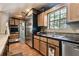 Well-equipped kitchen featuring stainless steel appliances, wooden cabinets, and abundant counter space at 3018 Pemberton Trace Ct, Plant City, FL 33565