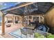 Backyard patio with an outdoor kitchen, fire pit and gazebo at 3018 Pemberton Trace Ct, Plant City, FL 33565