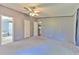 Bright bedroom with multiple closets and an open doorway leading to other rooms at 3203 21St Se Ave, Ruskin, FL 33570