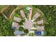 A serene neighborhood cul-de-sac with homes featuring pools,solar panels, and lush landscaping near the forest preserve at 3305 Hoylake Ct, Land O Lakes, FL 34638