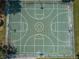 Aerial view of a full-sized basketball court with well-maintained surface and clear boundary lines at 3305 Hoylake Ct, Land O Lakes, FL 34638