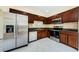 Well-equipped kitchen with stainless steel appliances, granite countertops, and ample storage space at 3305 Hoylake Ct, Land O Lakes, FL 34638