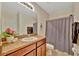 Cozy bathroom featuring a vanity with granite countertops and a shower-tub combination at 3320 Pleasant Willow Ct, Brandon, FL 33511