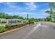 Community entrance showcasing The District's sign, gate, and landscaped surroundings at 3320 Pleasant Willow Ct, Brandon, FL 33511