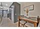 Dining area next to entryway features neutral wall paint and a rustic-style table with seating for four at 3320 Pleasant Willow Ct, Brandon, FL 33511
