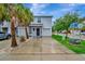 Well-maintained townhouse with a two-car garage, neat landscaping, and a welcoming entrance at 3320 Pleasant Willow Ct, Brandon, FL 33511