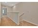 Hallway area with carpet flooring and a view of the room through the open doorway at 3320 Pleasant Willow Ct, Brandon, FL 33511