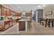 Spacious eat-in kitchen with stainless steel appliances, granite countertops, and a central island with seating at 3320 Pleasant Willow Ct, Brandon, FL 33511
