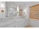 Elegant bathroom with marble countertops, double sinks, and gold fixtures exudes luxury at 334 11Th Ne Ave, St Petersburg, FL 33701