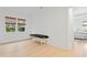 Bright bedroom with wood floors, natural light, and a massage table creates a relaxing atmosphere at 334 11Th Ne Ave, St Petersburg, FL 33701