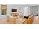 Bright living room with a flatscreen TV and natural light from the windows at 334 11Th Ne Ave, St Petersburg, FL 33701