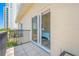 Balcony with view of the bedroom through a sliding glass door, enhancing the indoor-outdoor flow at 340 1St N St # I, St Petersburg, FL 33701