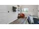 Cozy bedroom featuring built-in bookshelves, hardwood floors, and bright natural light at 340 1St N St # I, St Petersburg, FL 33701