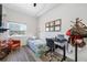 Bedroom featuring ample natural light, a comfortable bed, and a well-equipped workspace at 340 1St N St # I, St Petersburg, FL 33701