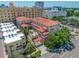 Exterior of the property featuring a courtyard and well-maintained landscaping at 340 1St N St # I, St Petersburg, FL 33701