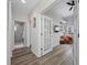 Hallway view leading to a glass-enclosed office and adjacent bathroom at 340 1St N St # I, St Petersburg, FL 33701