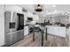 Modern kitchen featuring stainless steel appliances and adjacent breakfast nook at 340 1St N St # I, St Petersburg, FL 33701