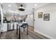 Bright and modern kitchen with stainless steel appliances, seating area, and stylish decor at 340 1St N St # I, St Petersburg, FL 33701