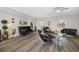 Comfortable living room with contemporary furniture, hardwood flooring, and a welcoming atmosphere at 340 1St N St # I, St Petersburg, FL 33701