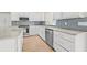 Bright kitchen with stainless steel appliances, sleek countertops, and ample storage at 352 La Hacienda Dr, Indian Rocks Beach, FL 33785