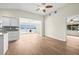 Open floor plan with a view from the kitchen to the living area and waterfront access at 352 La Hacienda Dr, Indian Rocks Beach, FL 33785