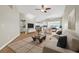 Comfortable living room features modern décor, hardwood floors and lots of light at 352 La Hacienda Dr, Indian Rocks Beach, FL 33785
