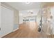 Spacious living room with hardwood floors and ample natural light at 352 La Hacienda Dr, Indian Rocks Beach, FL 33785