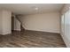 Spacious living room featuring hardwood floors and natural light at 37147 Sagemoor Dr, Zephyrhills, FL 33541