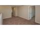 Upstairs loft with neutral walls and carpet at 37147 Sagemoor Dr, Zephyrhills, FL 33541
